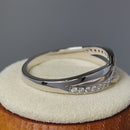 Sterling Silver Clear CZ Infinity Twist Ring