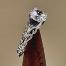 Sterling Silver Swirl Design Clear and Blue CZ Ring