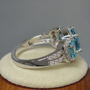 Sterling Silver Aqua Blue Three Stone Halo CZ Ring