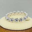 Sterling Silver Plumeria Blue Spinel CZ Eternity Band Ring