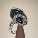 Sterling Silver Black Onyx Oval Wrap Marcasite Ring
