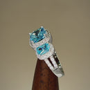 Sterling Silver Aqua Blue Three Stone Halo CZ Ring