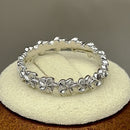 Sterling Silver Plumeria Eternity Band Ring