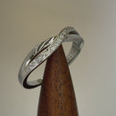 Sterling Silver Clear CZ Infinity Twist Ring