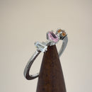 Sterling Silver Round Pear and Tapered Baguette Pink and Champagne CZ Ring