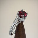 Sterling Silver Swirl Design Garnet and Clear CZ Ring