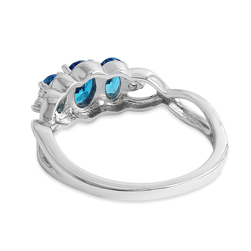 Sterling Silver Triple Oval Blue Topaz CZ Ring