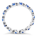 Sterling Silver Swirl Blue Spinel Eternity CZ Ring