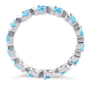 Sterling Silver Swirl Aqua Blue Topaz Eternity CZ Ring