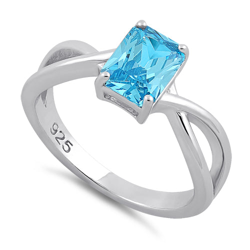 Sterling Silver Twist Emerald Cut Blue Topaz CZ Ring