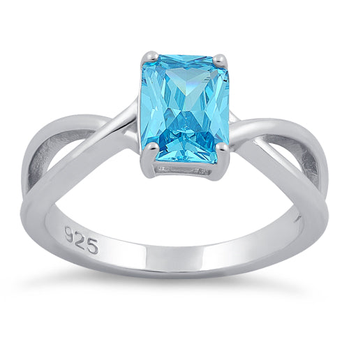 Sterling Silver Twist Emerald Cut Aqua Blue CZ Ring
