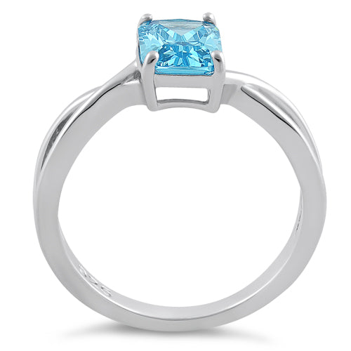 Sterling Silver Twist Emerald Cut Aqua Blue CZ Ring