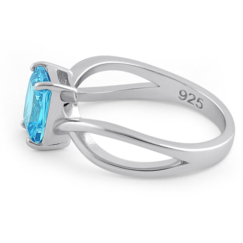 Sterling Silver Twist Emerald Cut Aqua Blue CZ Ring